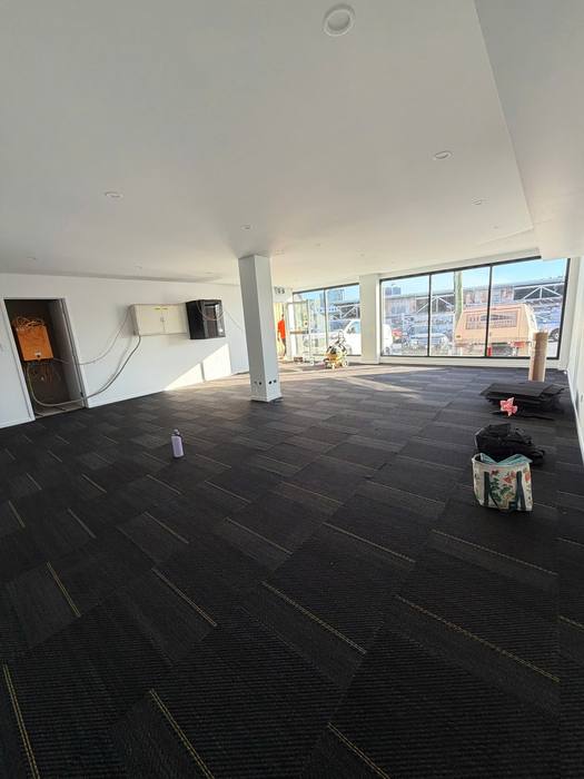 Carpet tile installation.