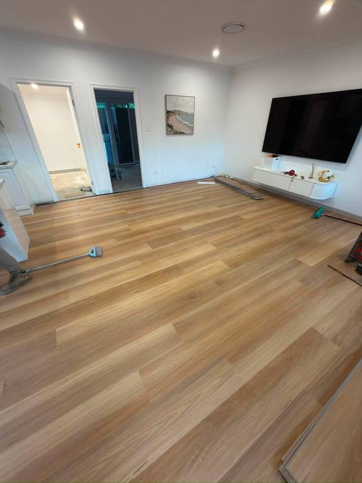 Hybrid flooring installation.
