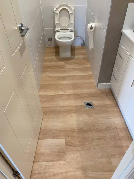 Vinyl plank flooring installation.