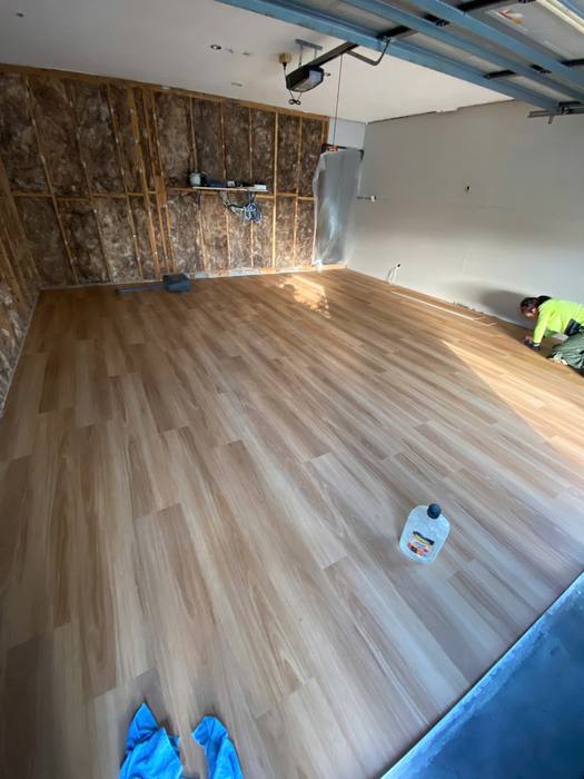 Vinyl plank flooring installation.