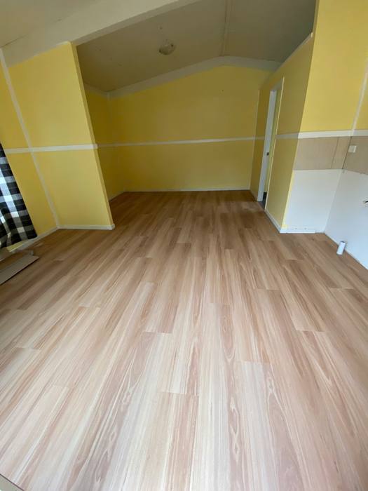Vinyl plank flooring installation.