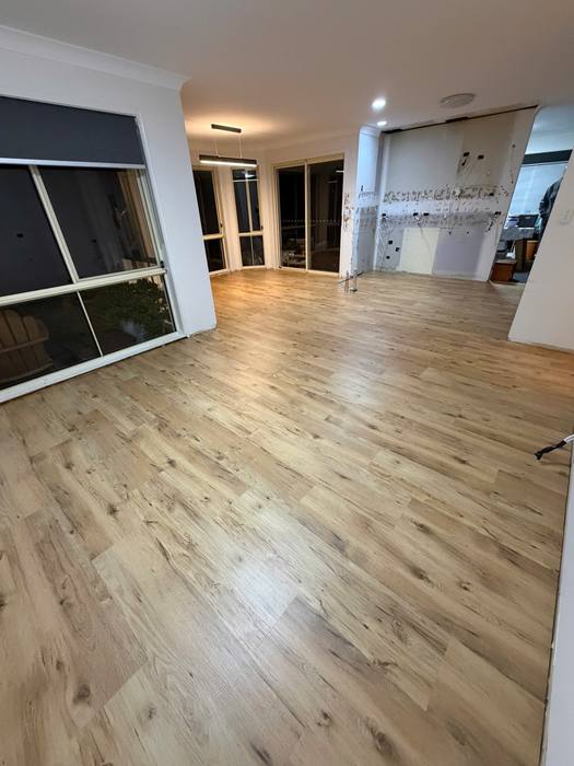 Vinyl plank flooring installation.